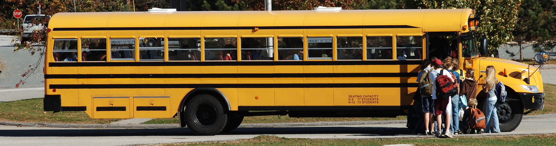 school bus with students loading