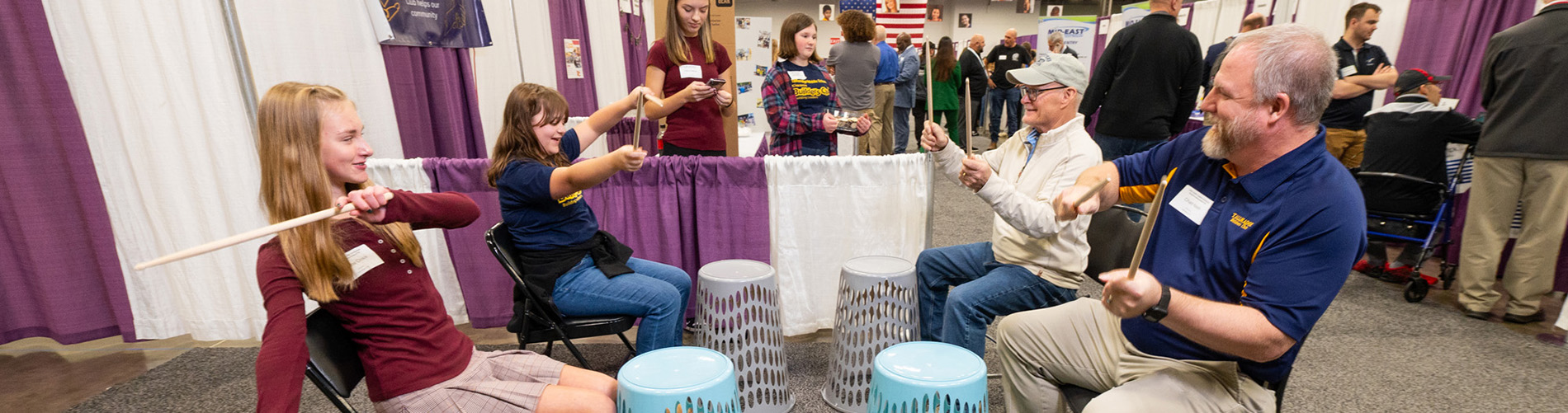 Students leading drum circle